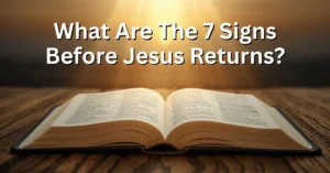 Bible open on a wooden table with glowing light symbolizing prophecy about the return of Jesus