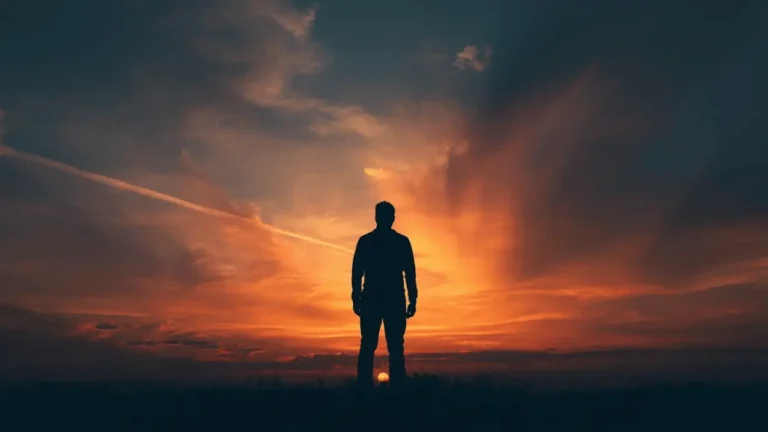 Human standing under sunlight looking toward the heavens, symbolizing humanity’s divine purpose according to the Bible