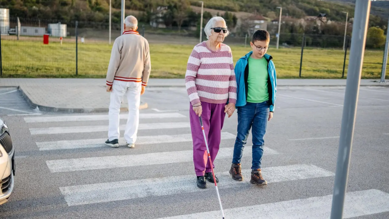 A person helping another in a simple daily moment reflecting Christian love and Gospel living