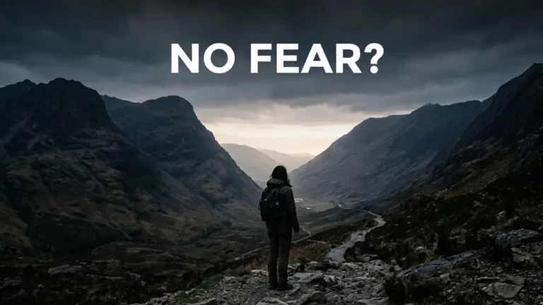 Person standing calmly in a valley representing the meaning of I will fear no evil in Psalm 23